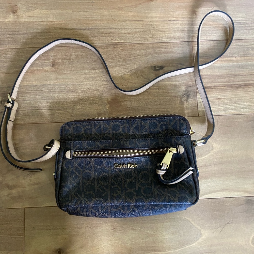 Brown Calvin Klein crossbody purse.